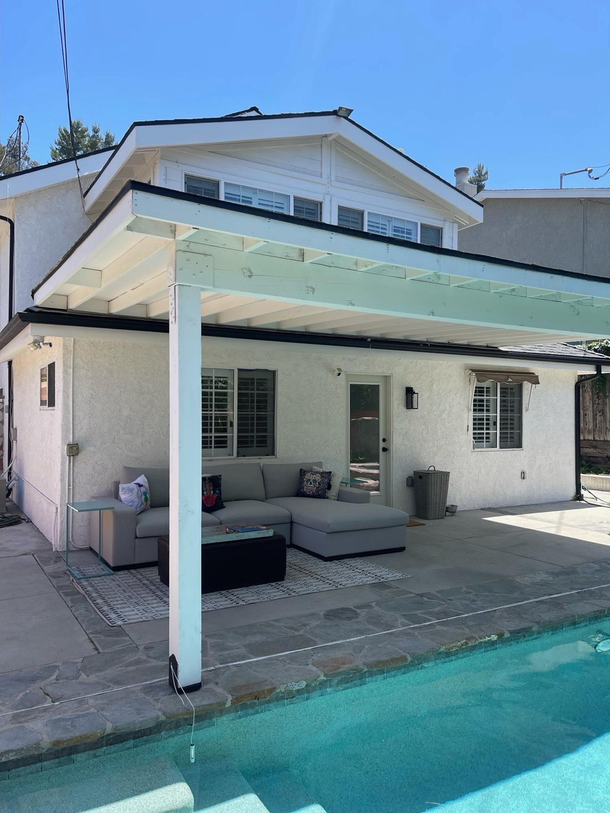 BEAUTIFUL WHITE home W great pool — photo 4