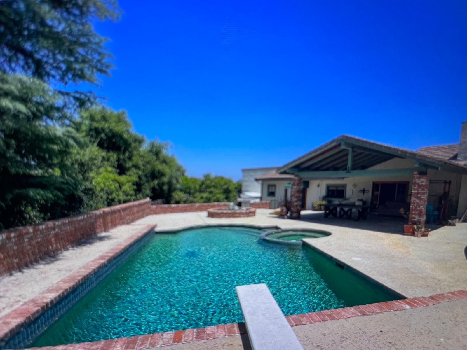 brick Home with pool and jacuzzi — photo 1