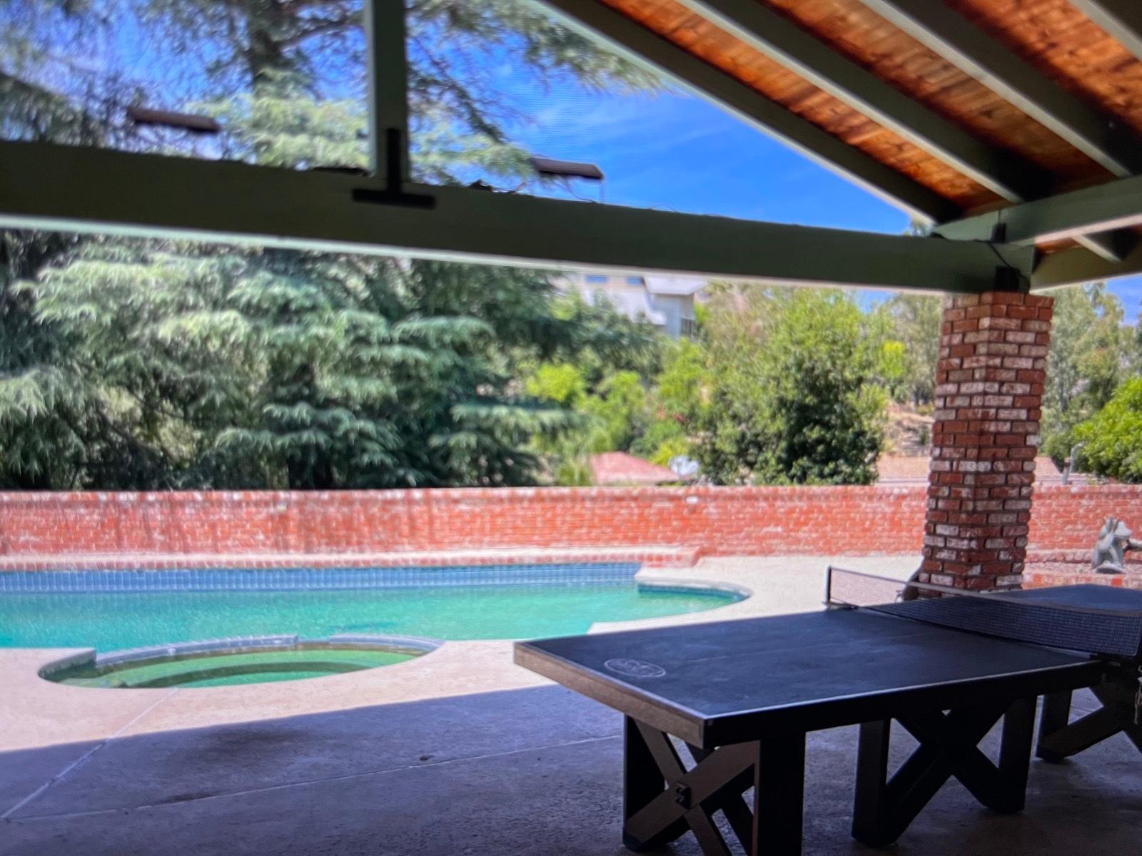 brick Home with pool and jacuzzi — photo 2