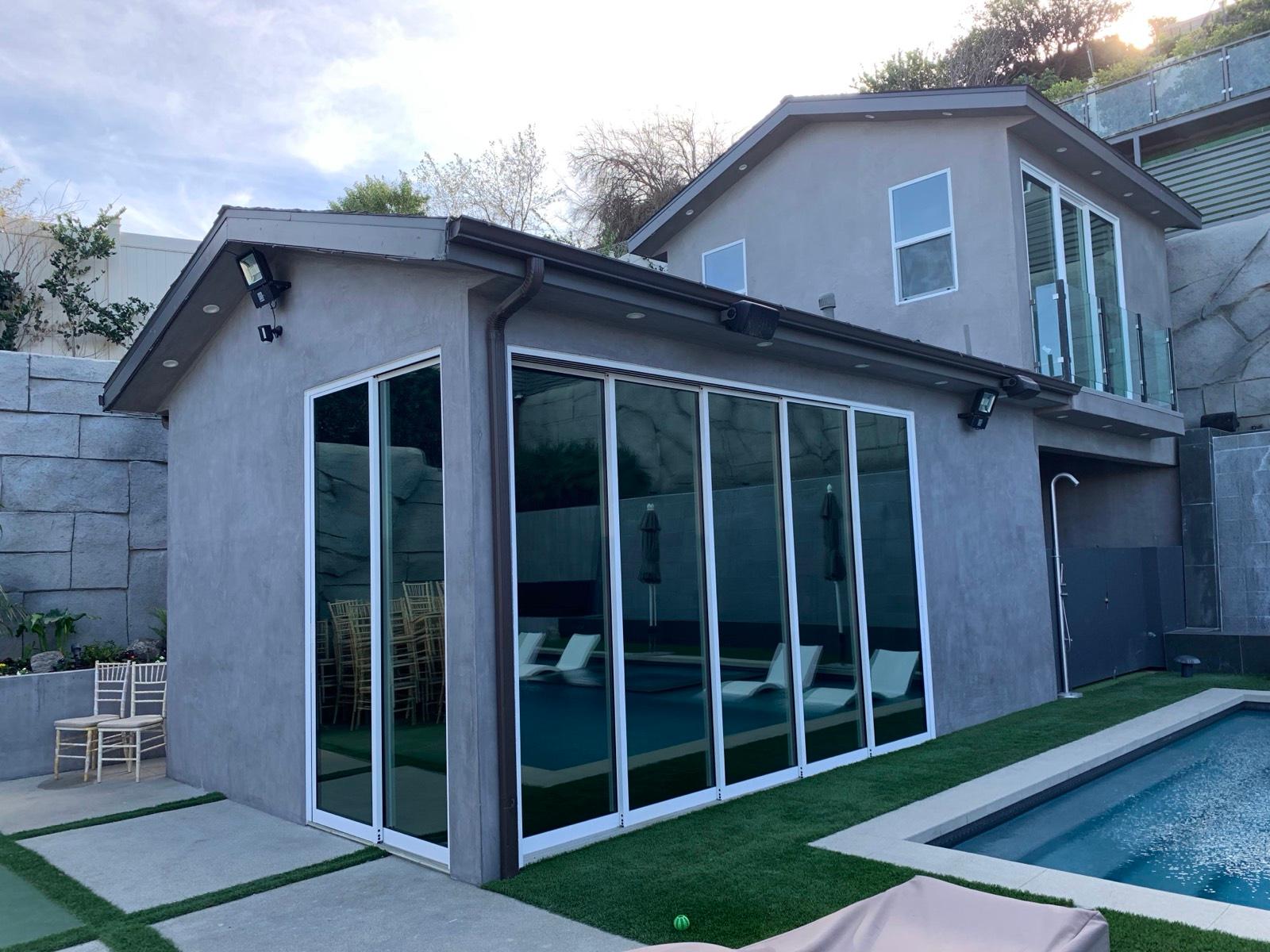 J's Gray Entertainer Modern Home — photo 1